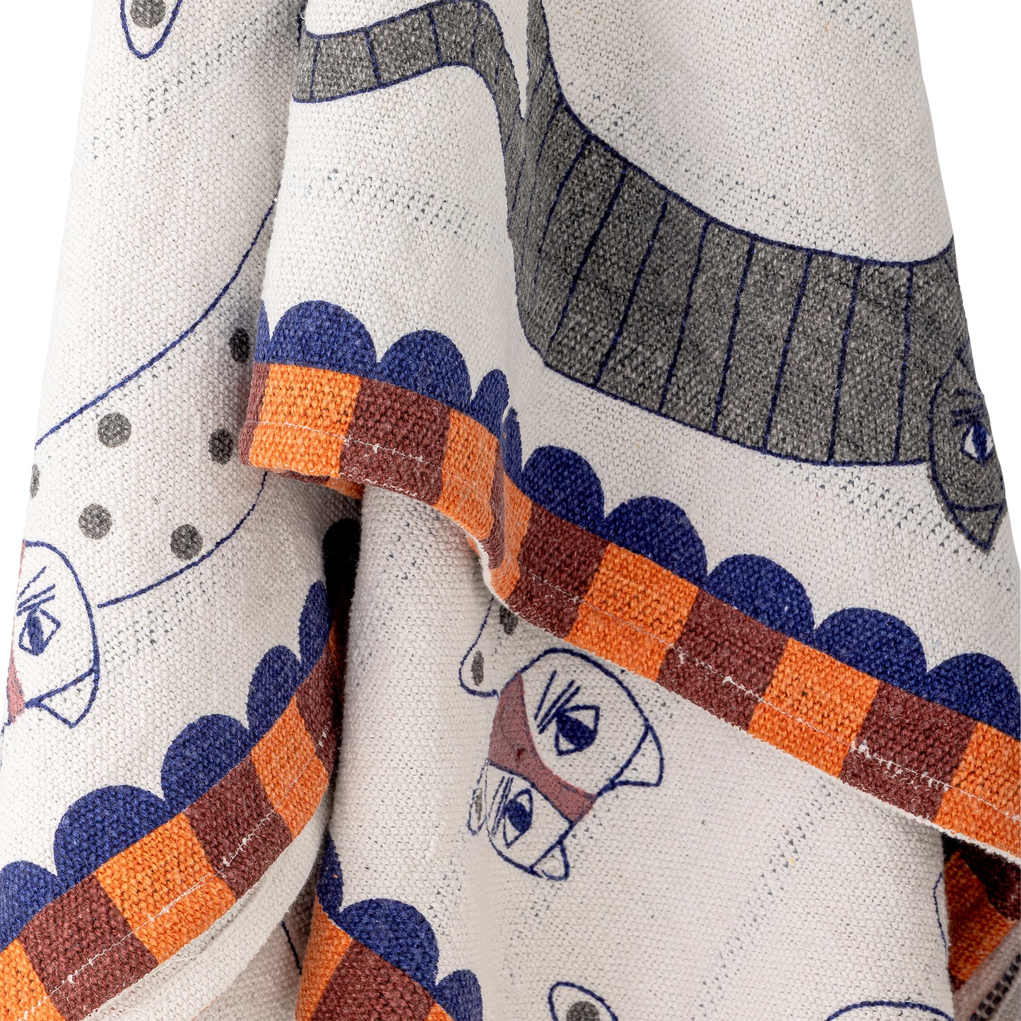 Close-up of a fabric with cartoon character design and striped pattern