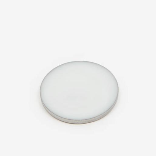 Mojo solid perfume balm disc  on a light gray background