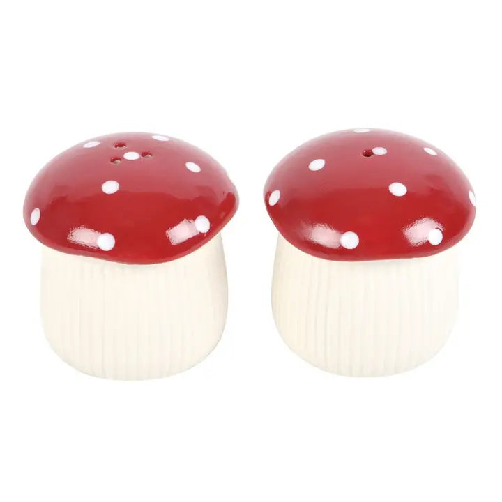 Red and White Mushroom salt and pepper shakers on white background