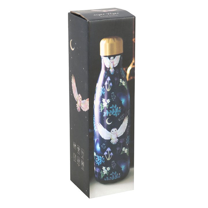 Decorative bottle with gold cap in a black box packaging