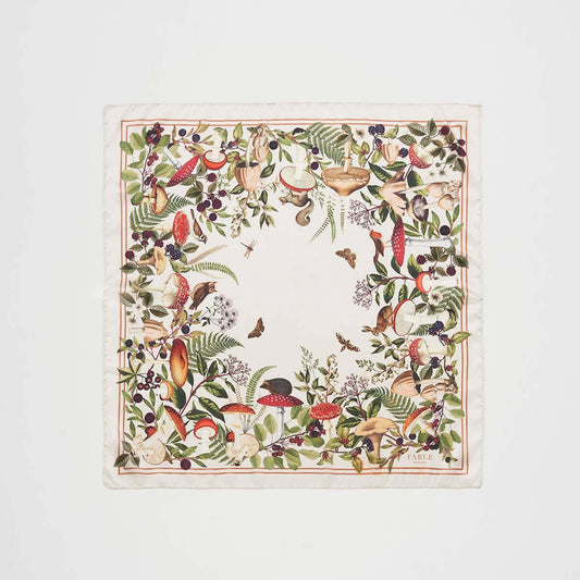 Decorative scarf with nature-themed design on a white background