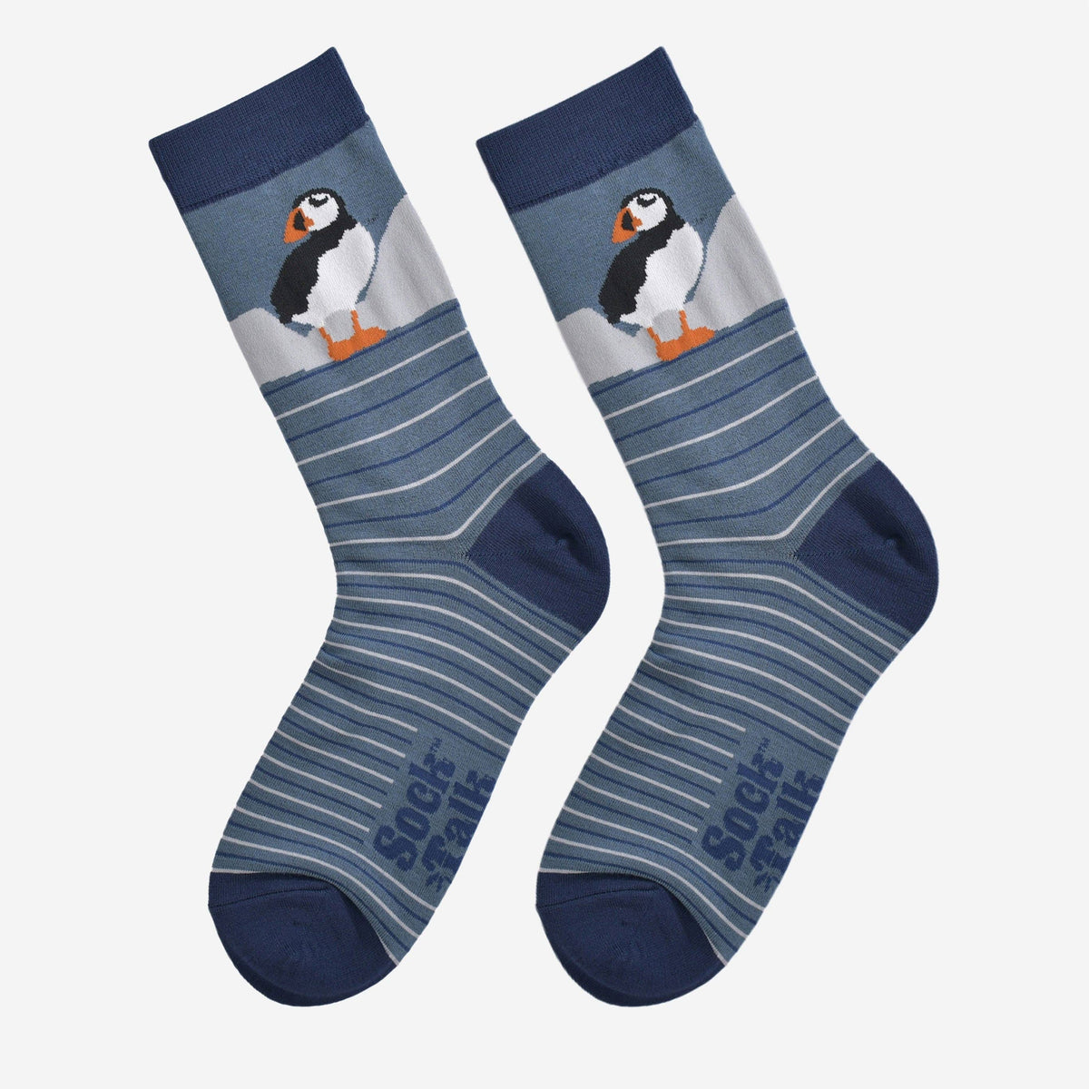 Pair of socks with puffin design on a white background