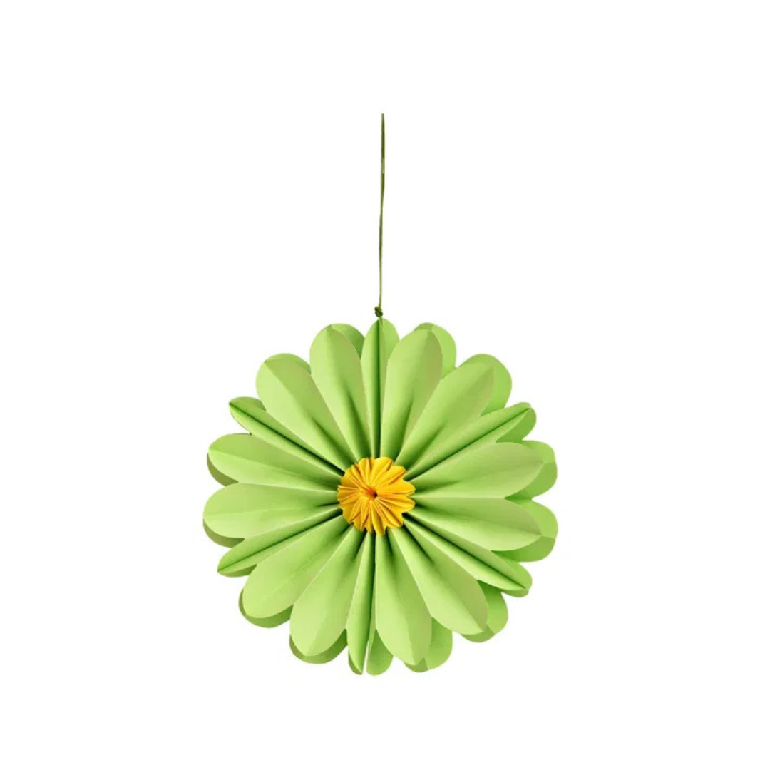 Green paper flower decoration with a yellow center on a white background
