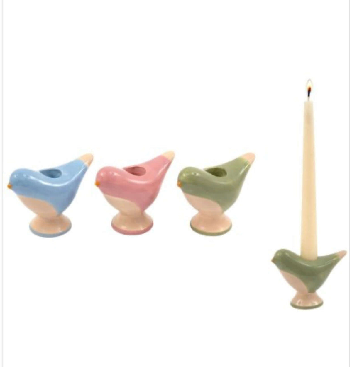 Three small bird-shaped candle holders in pastel blue, pink, and sage green, with a cream candle standing in the right holder against a plain white background.