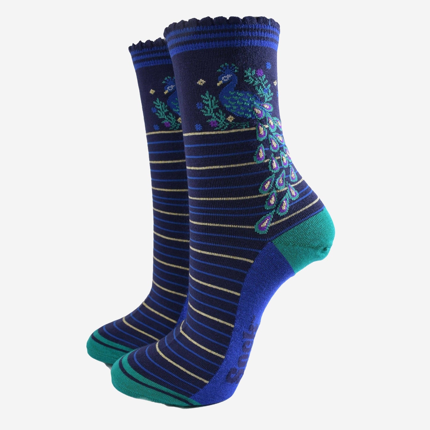 Pair of blue and green socks with peacock design on a white background