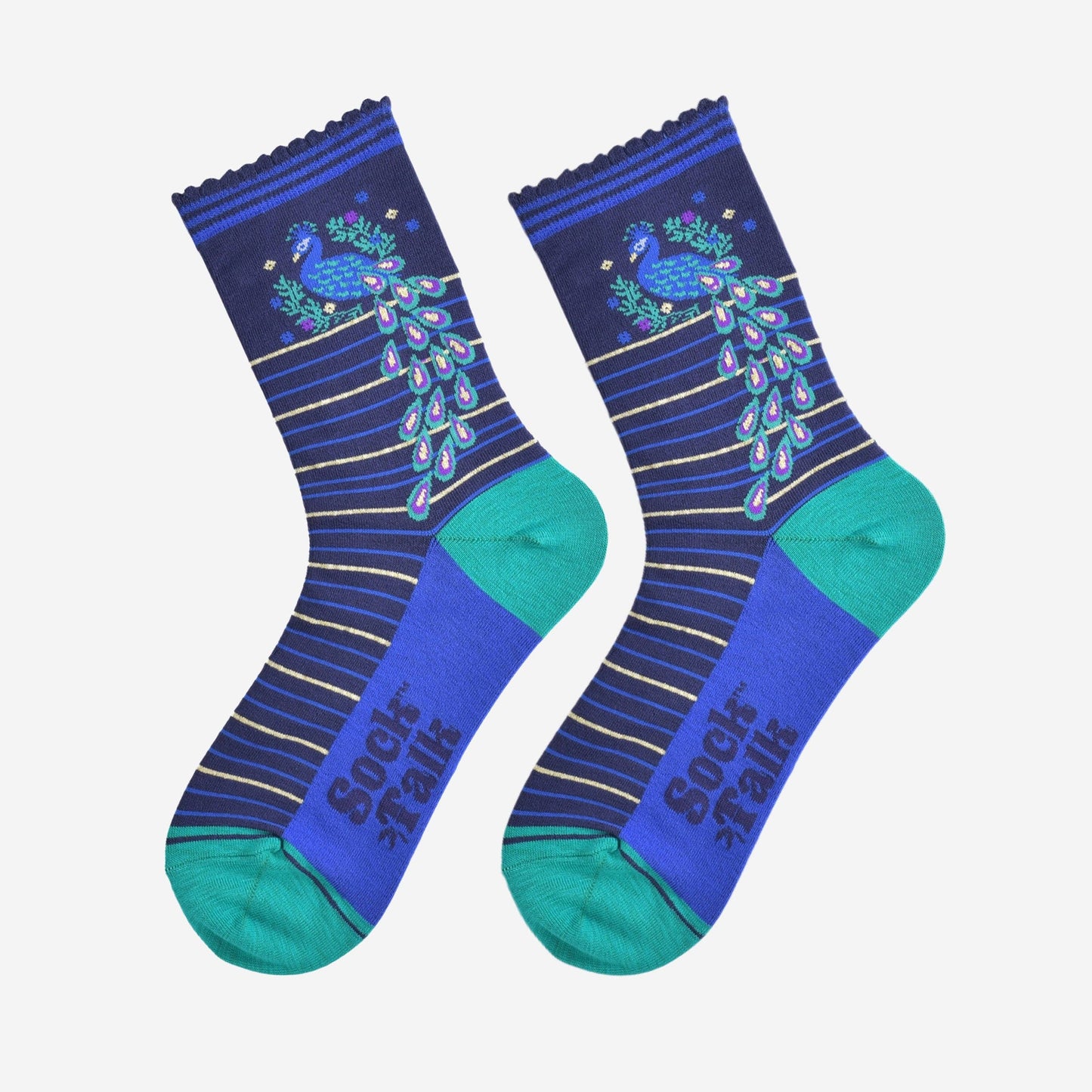 Pair of blue socks with peacock design on a white background