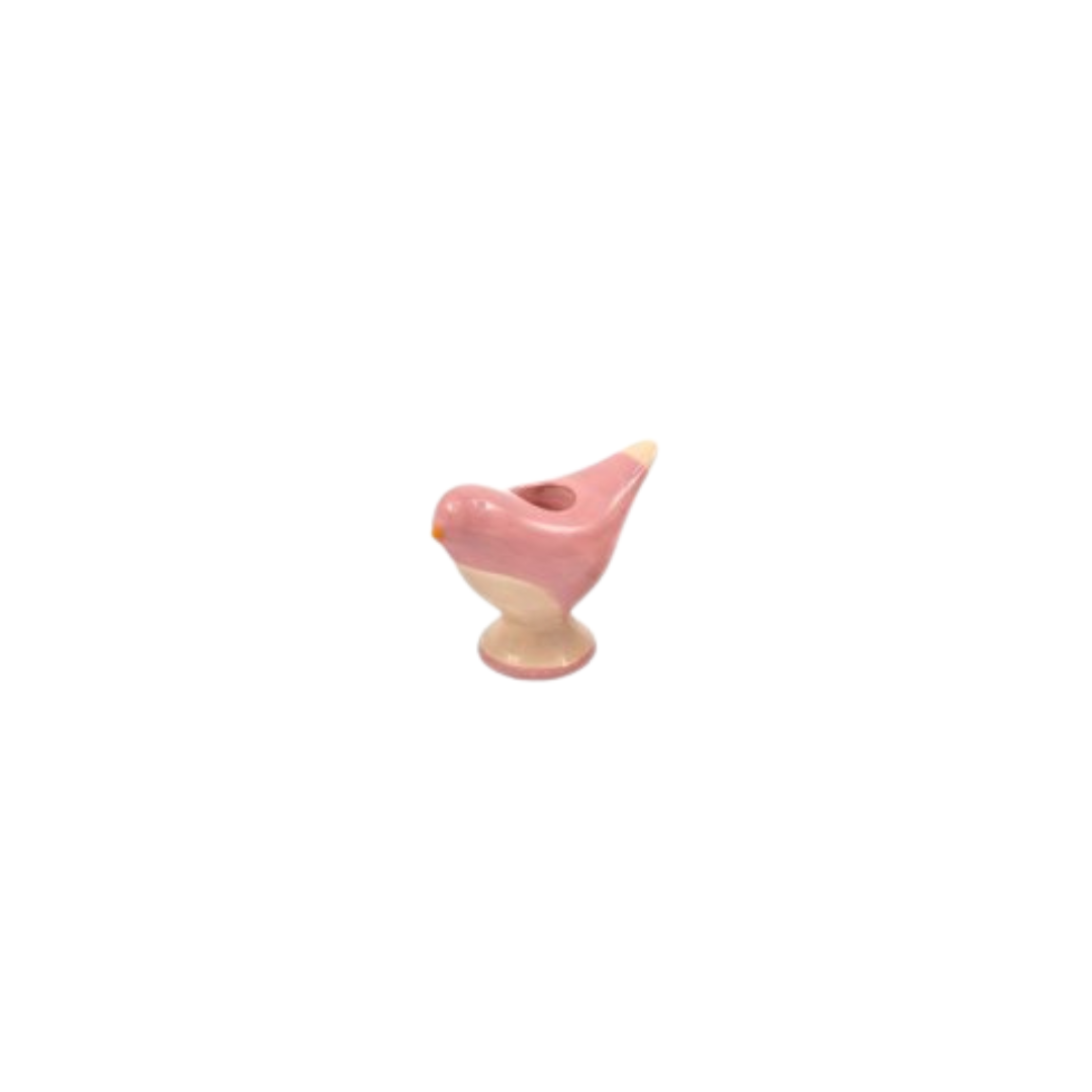 A small ceramic bird-shaped holder or candle holder in pink and cream, shown against a plain white background.
