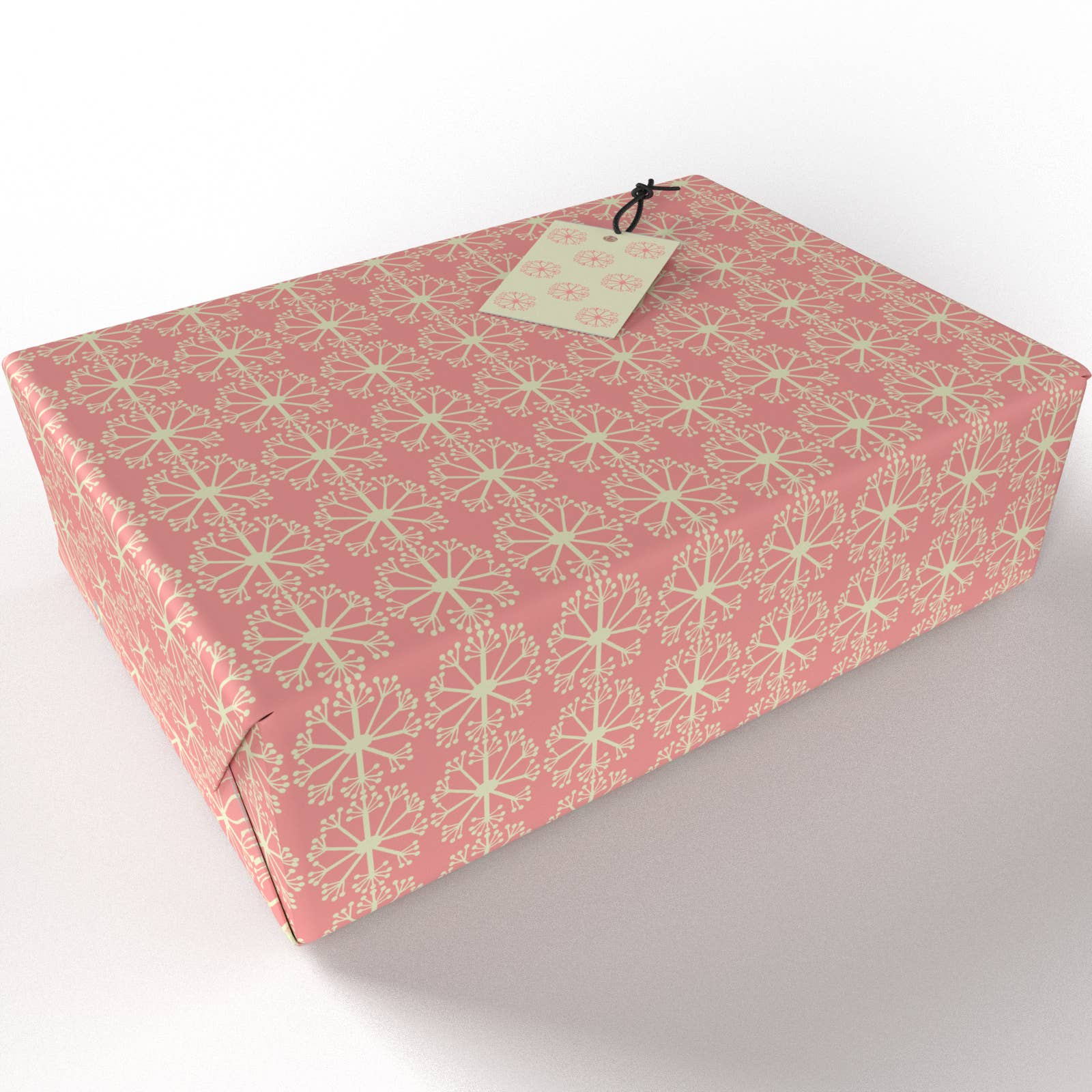 Pink Ditsy Wrapping Paper wrapped around a parcel on a white background