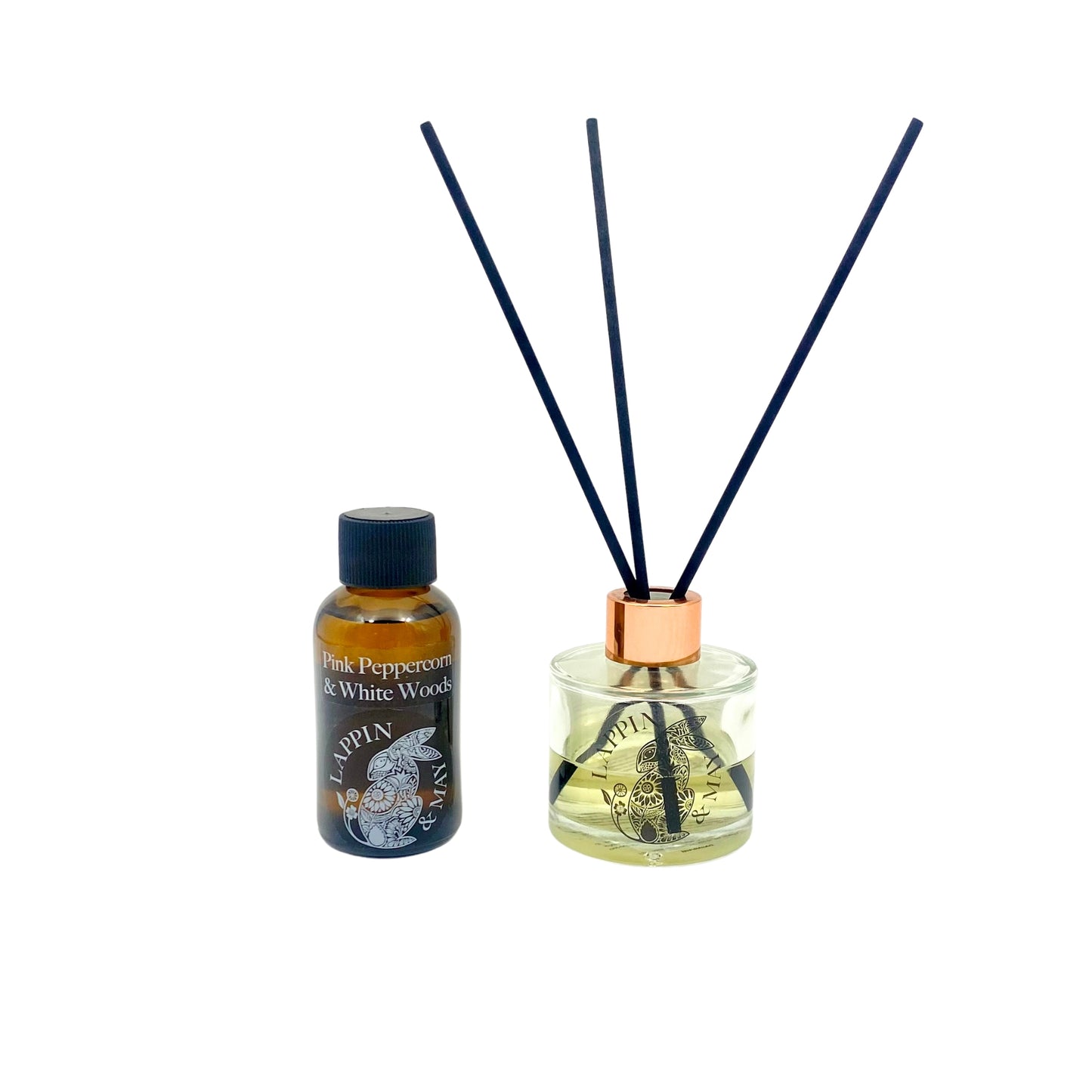 Pink peppercorn and white woods refill bottle on a white background