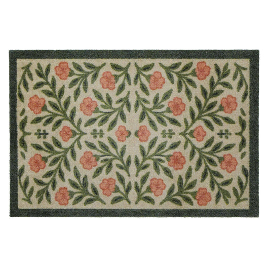 Floral patterned doormat with pink flowers and green leaves on a white background
