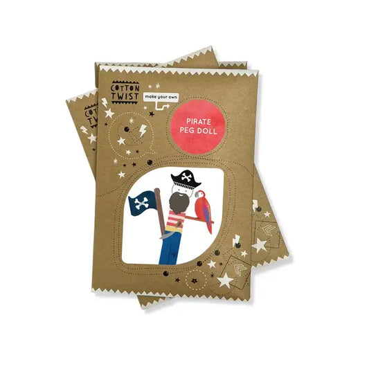 Pirate-themed peg doll set, featuring a cardboard cutout of a pirate with a parrot, trousers, and a hat. The package has a 'Cotton Twist' branding and indicates the product is for ages 3+.