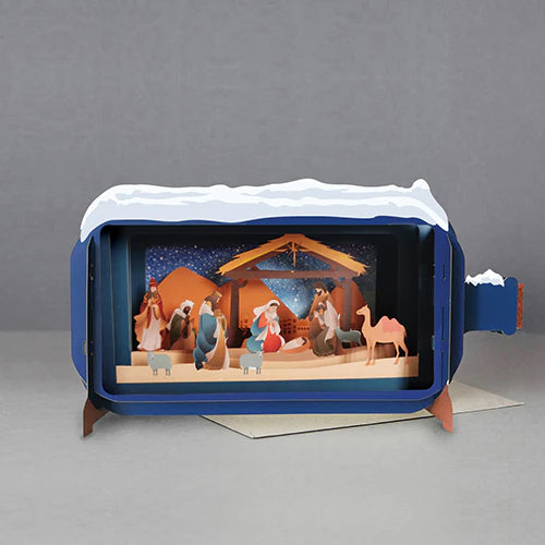 colourful pop up card shaped lie a bottle with the nativity scene