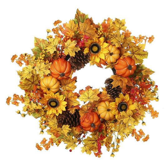 Decorative wreath with pumpkins, leaves, and sunflowers on a white background