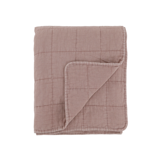 Dusky pink taupe quilt on white background