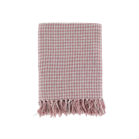 Pink and white checkered throw blanket with fringes on a white background