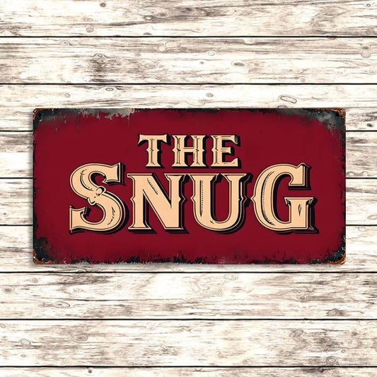 Vintage-style sign with 'The Snug' text on a wooden background
