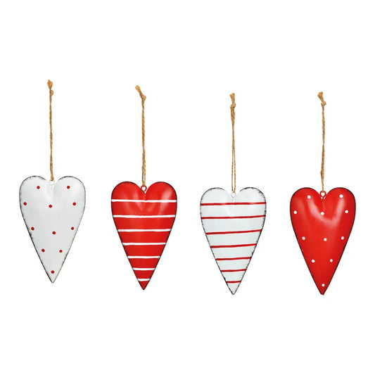 Four heart-shaped decorations with different patterns on a white background