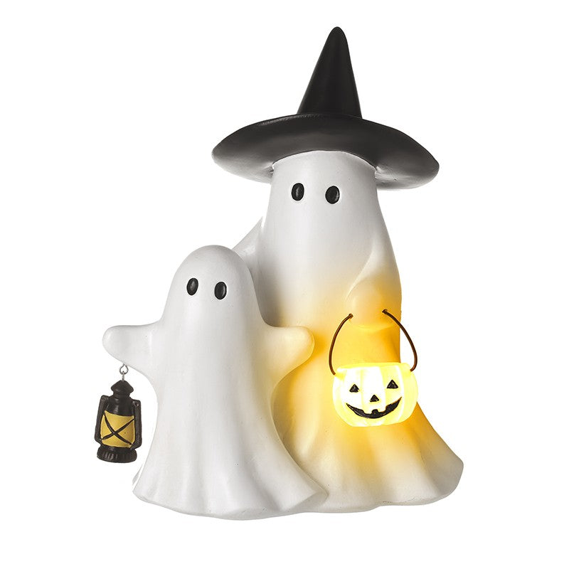 Halloween-themed ghost figurines with lanterns on a white background