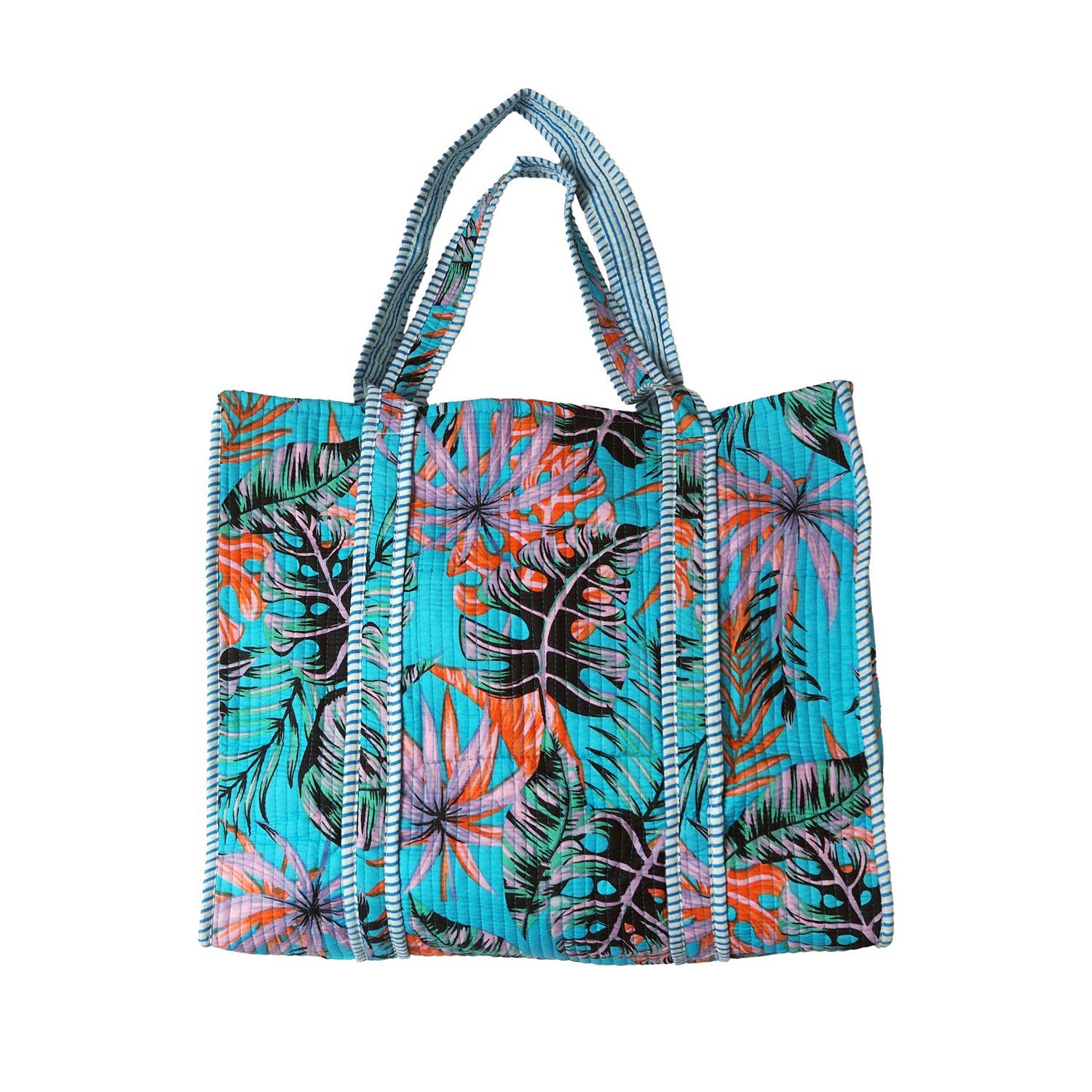 Tropical leaf patterned bag with blue background