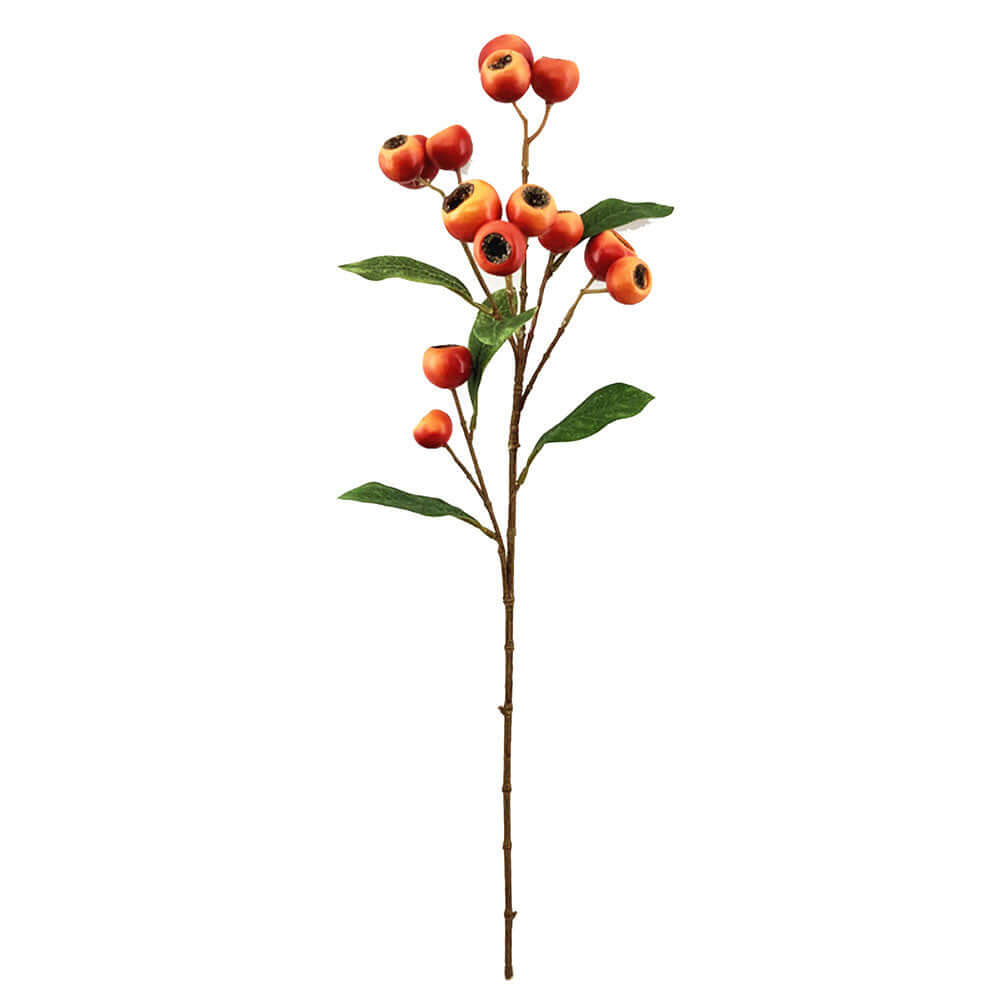 An artificial autumn rosehip stem featuring orange berries with dark centers, green leaves, and a brown stem, isolated on a white background.