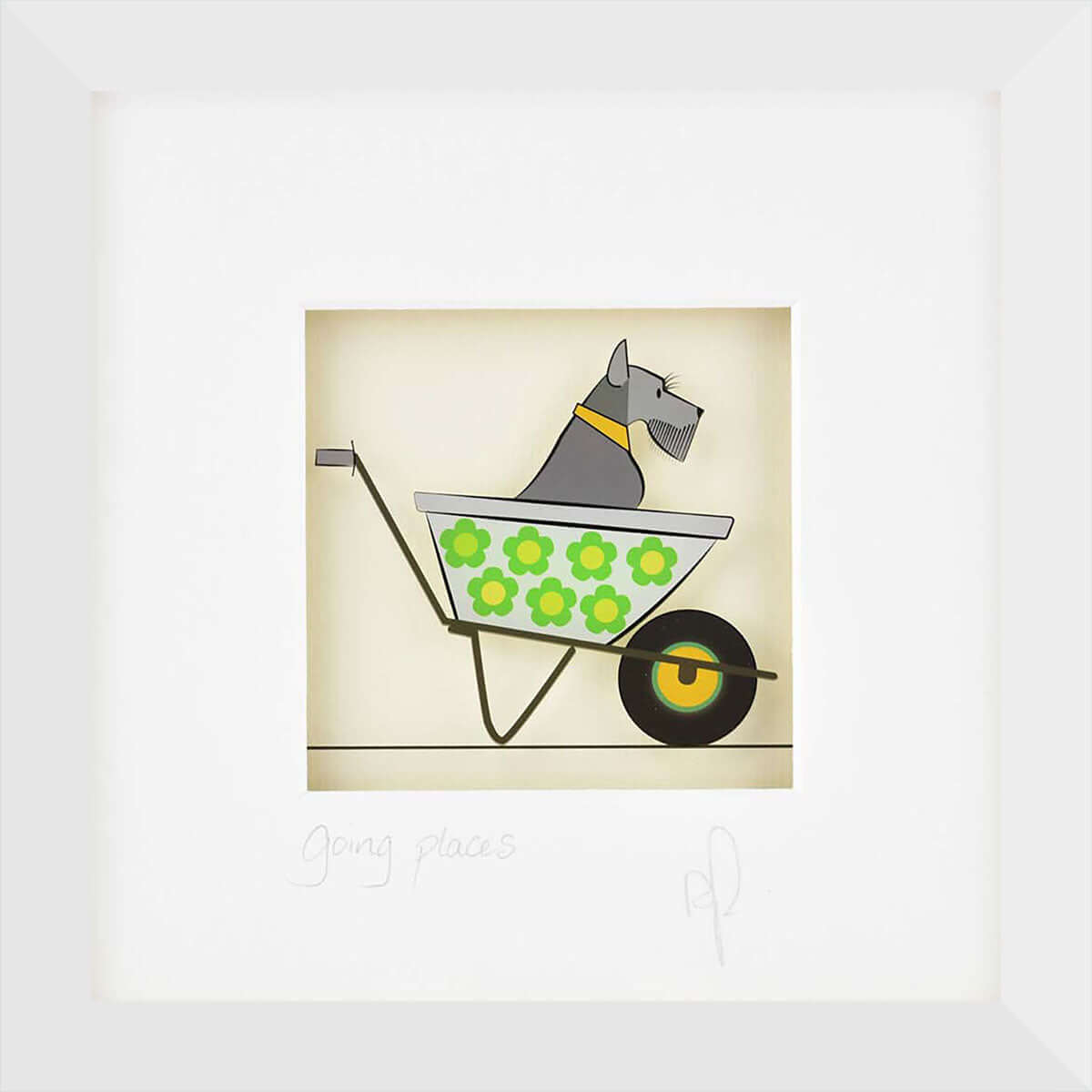 A framed image of a dog in a wheelbarrow