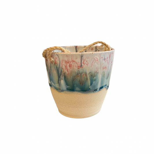 Beautiful handmade stoneware hanging plant pot with jute cord, glazed in pink, white and green glaze.  Inspired by Cherry Blossoms. Made in Northern Ireland 