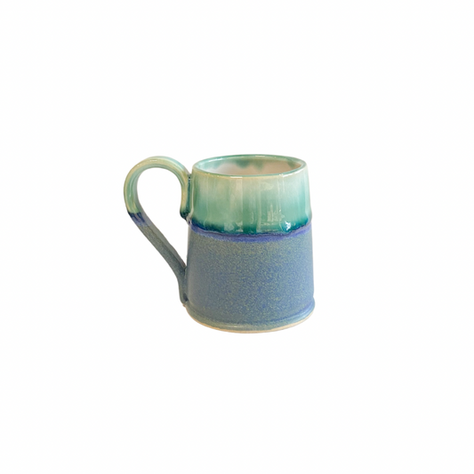 Medium sized hand thrown mug perfect for flat whites in blue and green glaze. Made in Northern Ireland