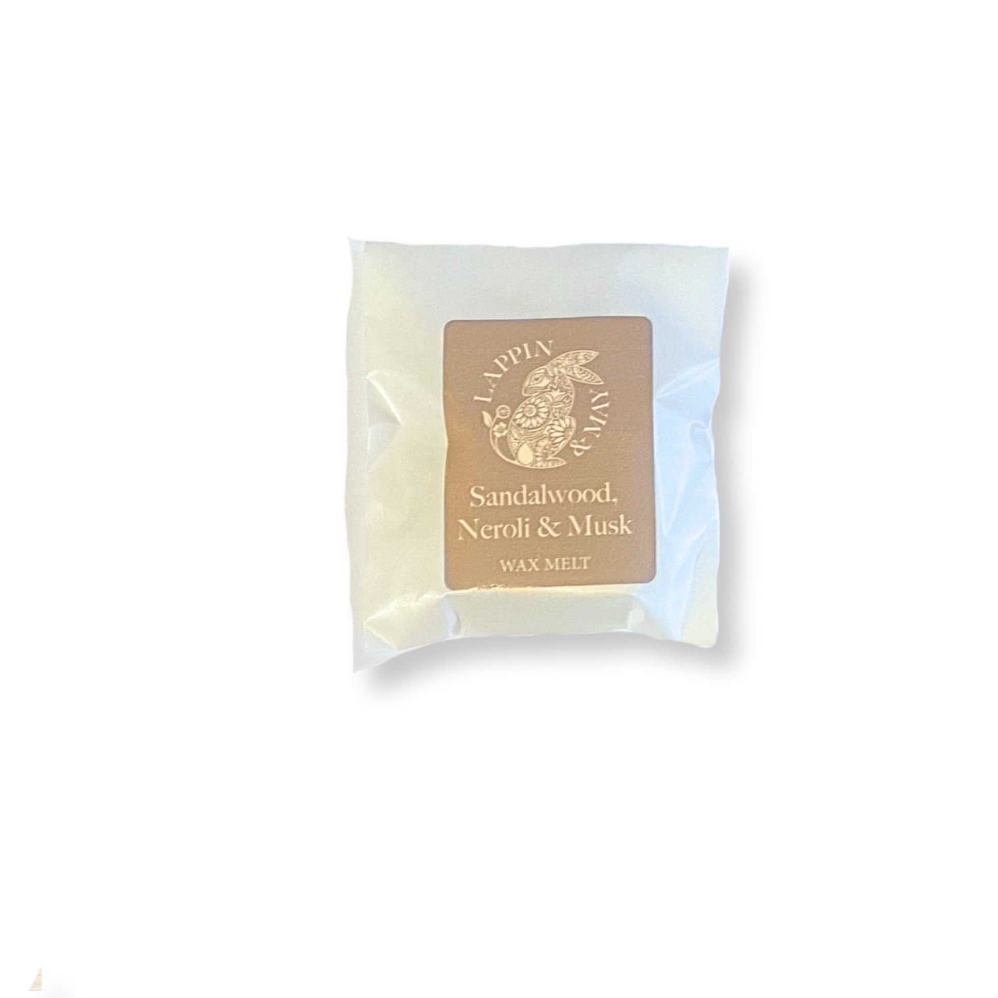 Wax melt packaging with sandalwood, neroli, and musk scent on a white background