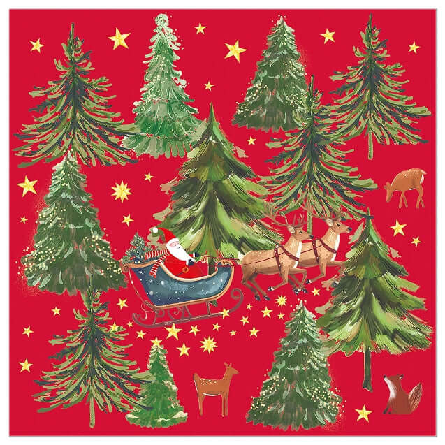 A square red Christmas-themed print napkin featuring illustrated evergreen trees, yellow stars, Santa in a blue sleigh with reindeer, and small woodland animals on a red background.