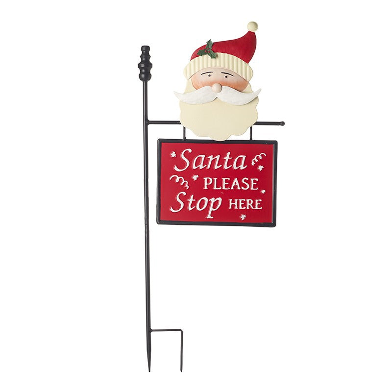 Decorative garden sign with Santa Claus face and 'Santa Please Stop Here' text on a white background