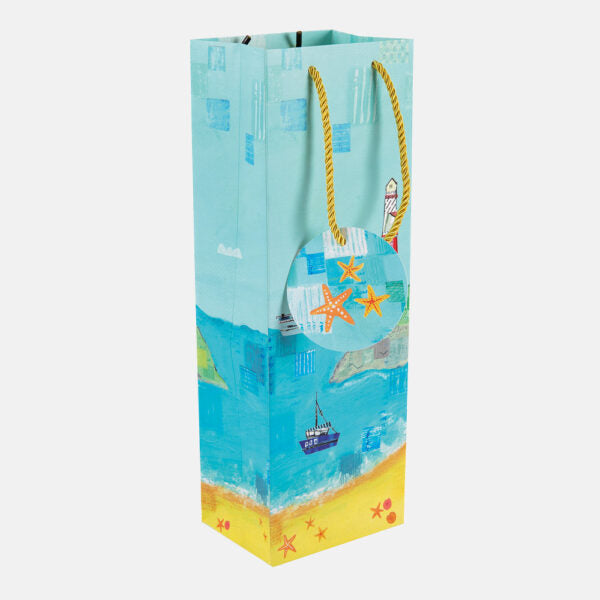 Gift bag with beach-themed design featuring a boat, starfish, and sand.