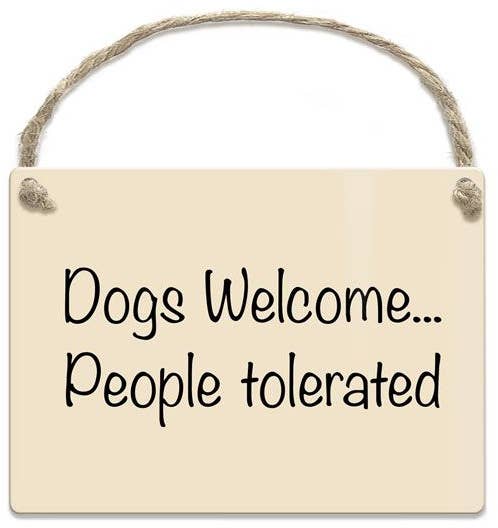 Sign with text 'Dogs Welcome... People tolerated' on a white background