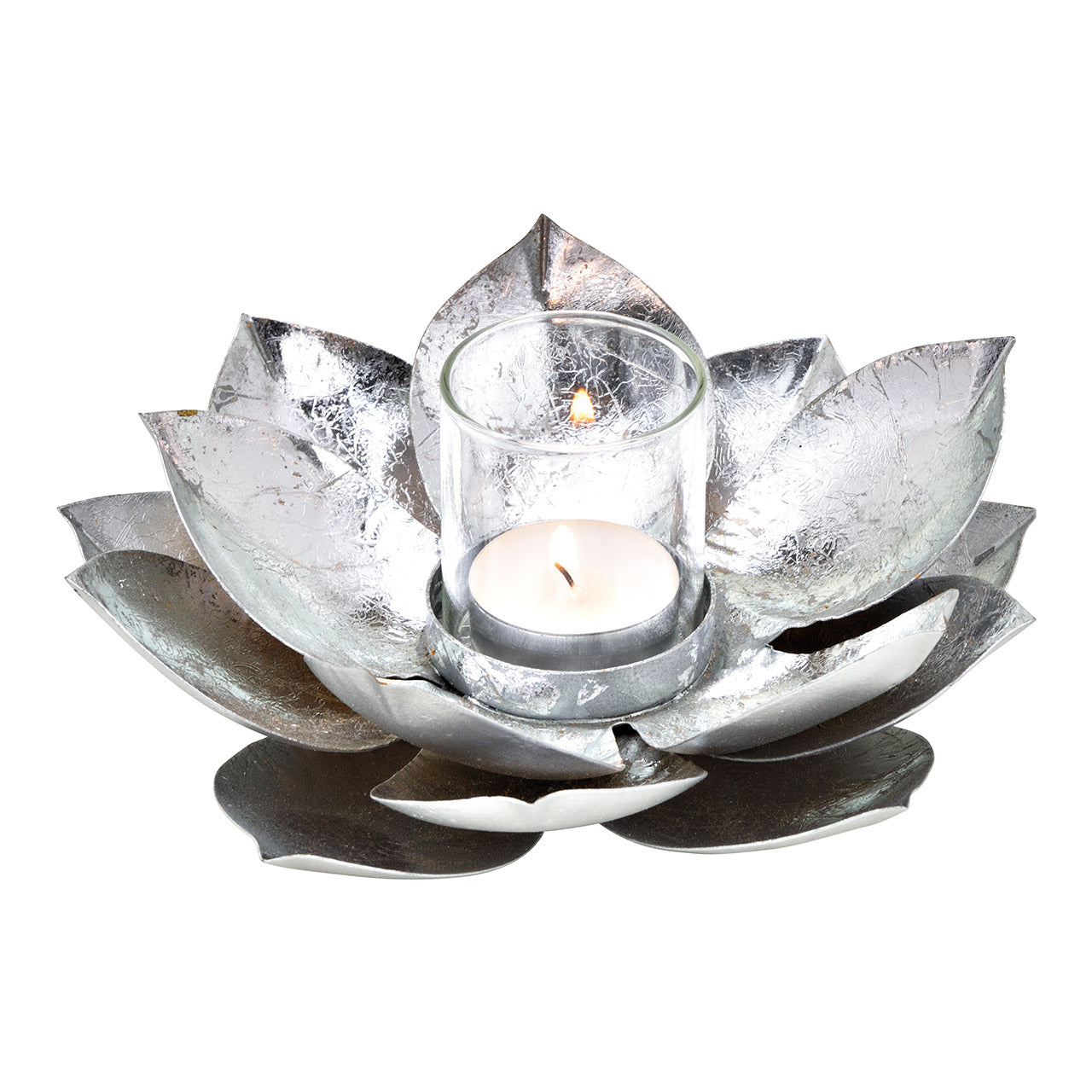 Silver lotus-shaped candle holder with a lit candle on a white background