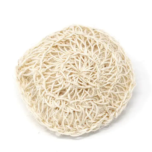 A beige sisal exfoliating pad with a textured, fibrous surface designed for use in bath and beauty routines.
