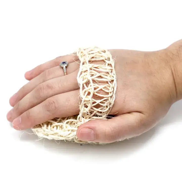 Sisal Exfoliating Pad on a hand