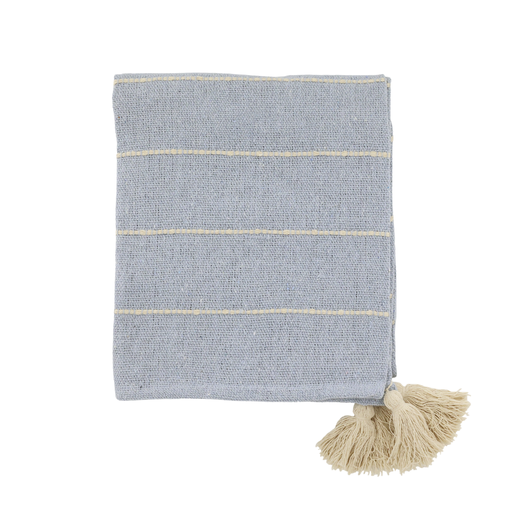 Blue striped throw blanket with tassels on a white background