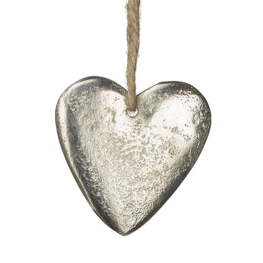 Silver heart-shaped hanging ornament on a white background