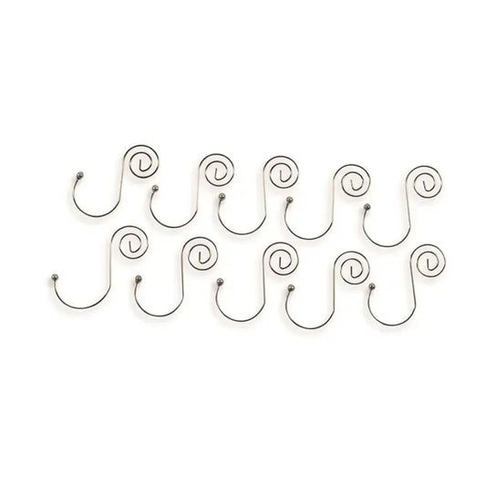 Set of metal wall hooks with decorative loops on a white background