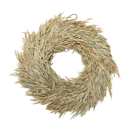 Woven straw wreath on a white background