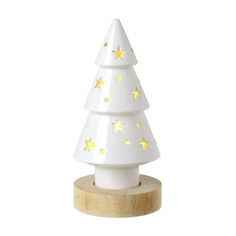 White ceramic Christmas tree with star decorations on a wooden base against a white background