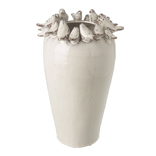 White ceramic vase with 3d bird design on a white background