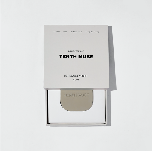 Tenth Muse solid perfume packaging on a light gray background