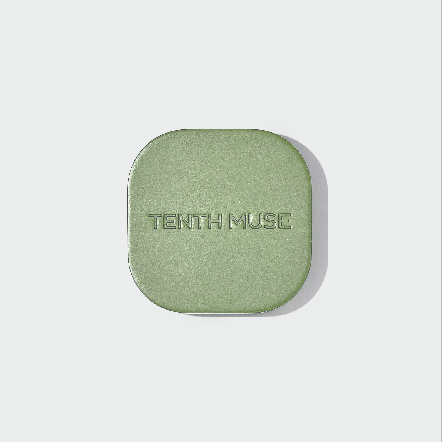 Green perfume case with 'Tenth Muse' branding on a light gray background