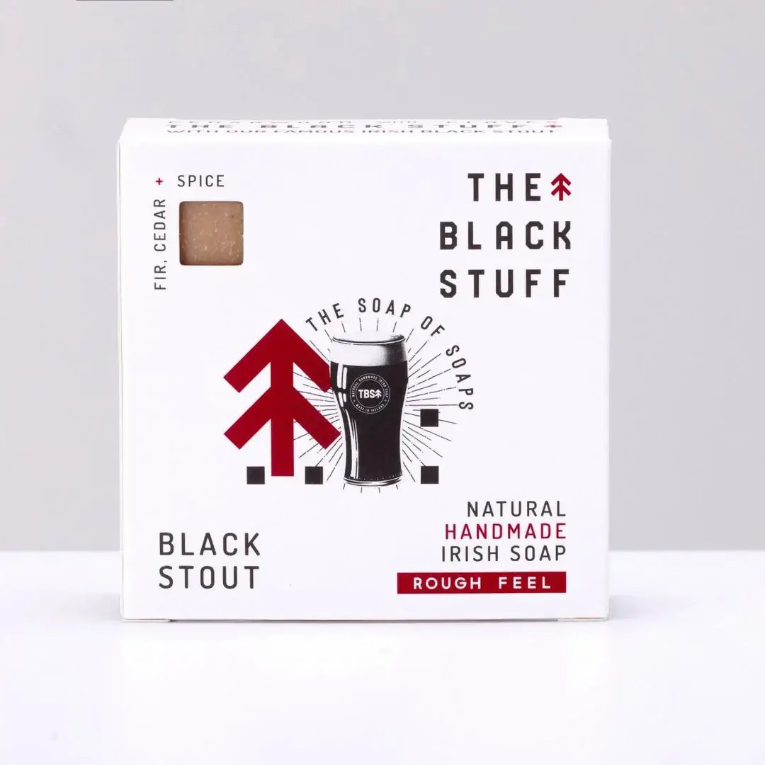 Packaged bar of Black Stout soap with branding and product information on the packaging.
