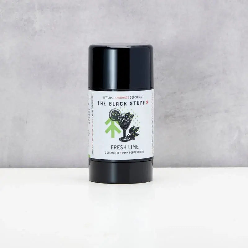 A stick deodorant with a black lid and label that reads 'fresh lime' with an illustration of a lime and leaves. The deodorant is vegan friendly and cruelty free.