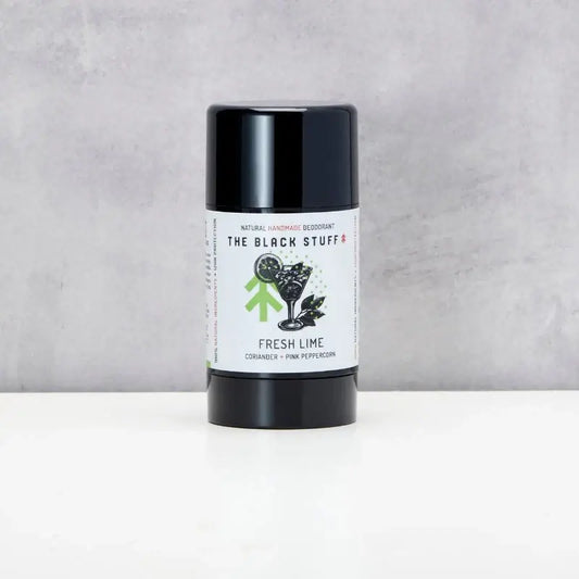 A stick deodorant with a black lid and label that reads 'fresh lime' with an illustration of a lime and leaves. The deodorant is vegan friendly and cruelty free.