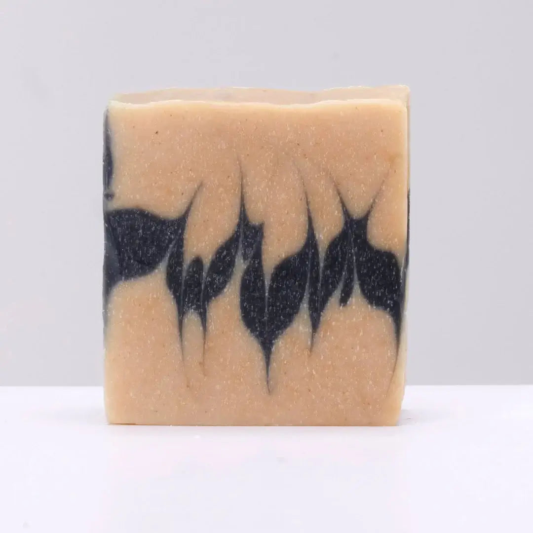 The Black Stuff Soap-The Good Room bar of soap sitting on a white background