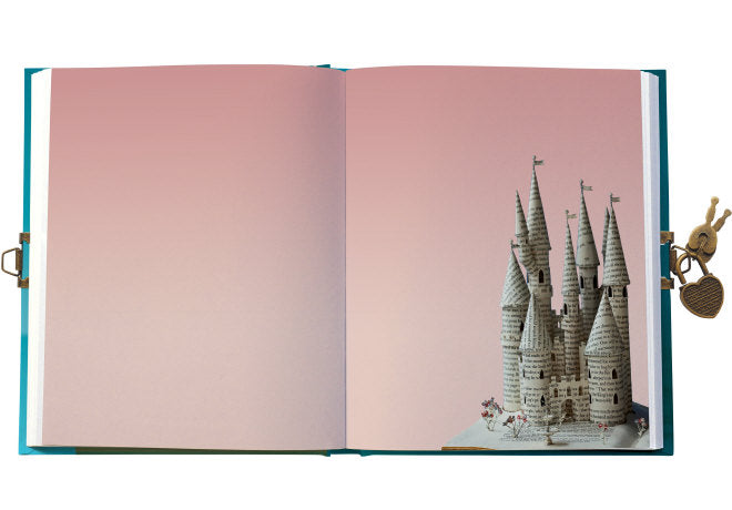 Open book with a sandcastle illustration on a pink background