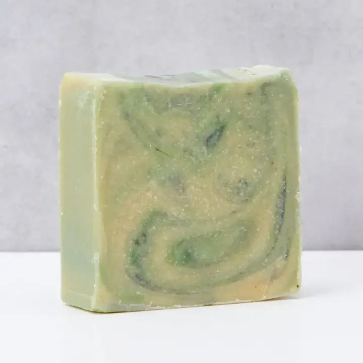 Bar of unwrapped 'The Shamrock Saint' natural soap by The Black Stuff 