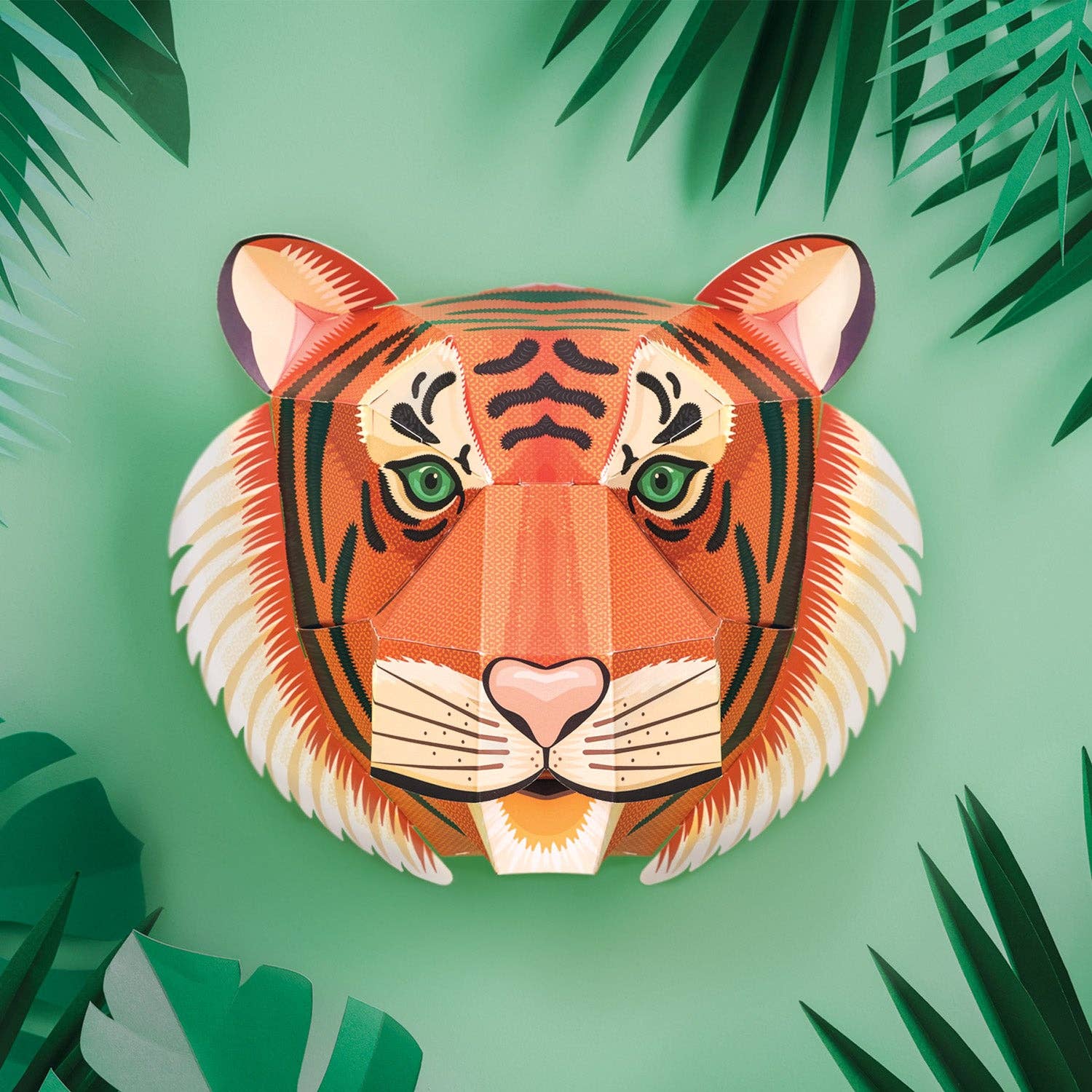 3D paper tiger model on a green background with leaf decorations